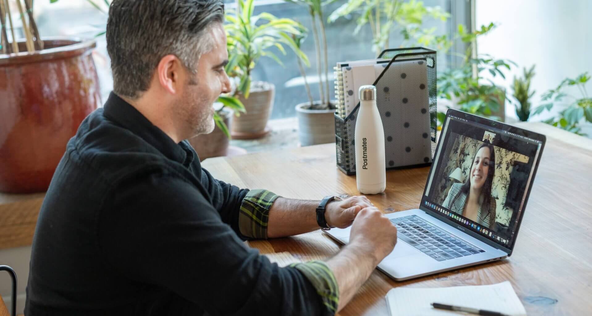 man on virtual call with co-worker